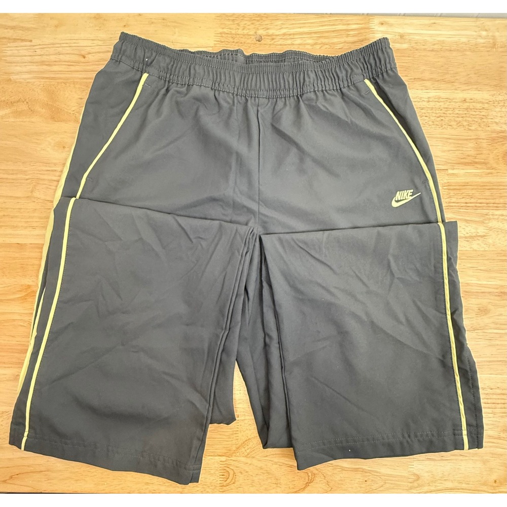 Nike Women S Black  Gold Track Athletic Windpants Sportswear Size S Split Hem